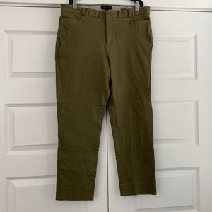 Green chino style trousers